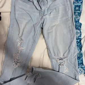 AE ripped light wash jeans